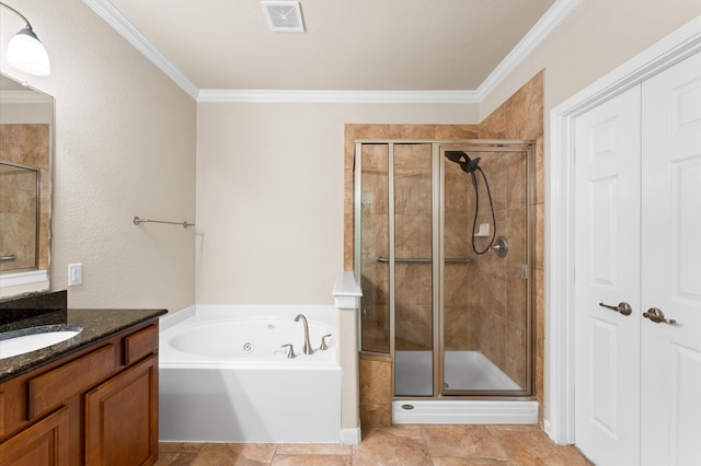 bathroom featuring vanity, visible vents, ornamental molding, a shower stall, and a bath