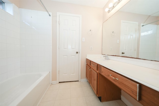 full bathroom with baseboards, vanity, washtub / shower combination, and tile patterned floors