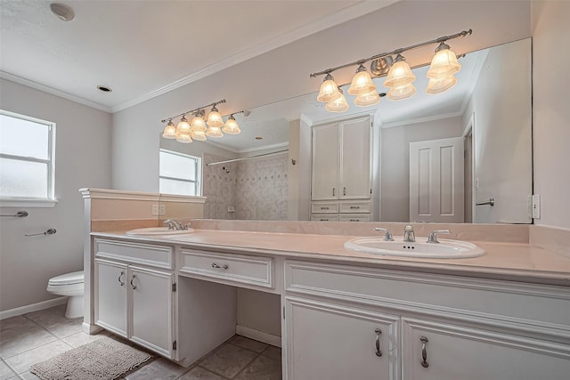 full bath featuring ornamental molding, a sink, toilet, and double vanity