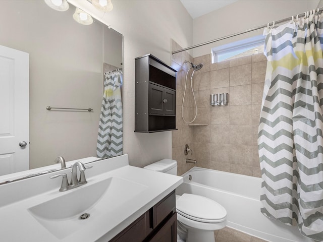 full bathroom with vanity, shower / bath combination with curtain, and toilet