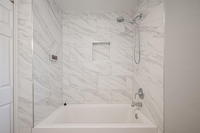 bathroom featuring tub / shower combination