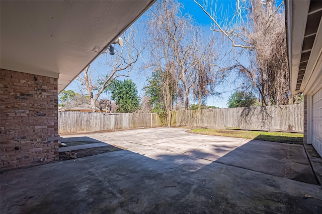 view of patio with a fenced backyard