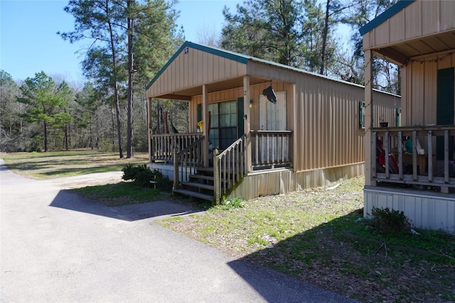 exterior space featuring covered porch