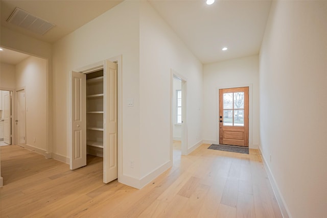 entryway with recessed lighting, visible vents, baseboards, and light wood-style floors