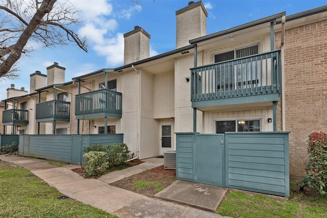 view of property with central AC