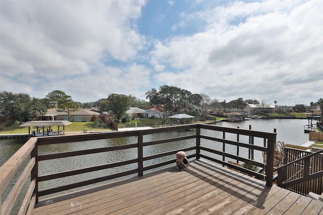 34 Lakeview Dr, Galveston, TX 77551 - dock area featuring a deck with water view and a residential view