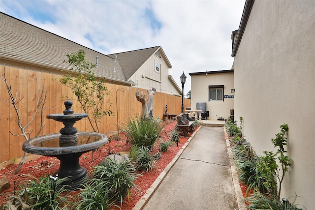 view of yard featuring a patio area and fence