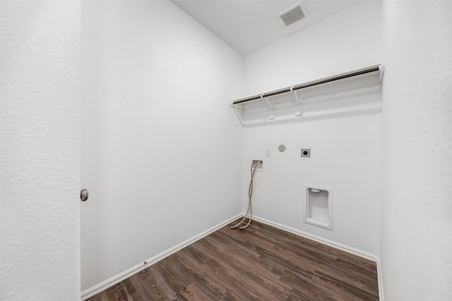 23923 Falling Daylight Dr, Hockley, TX 77447 - washroom featuring hookup for an electric dryer, hookup for a gas dryer, dark wood-style flooring, and baseboards