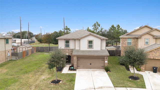 view of front of property with a front yard, brick siding, driveway, and fence