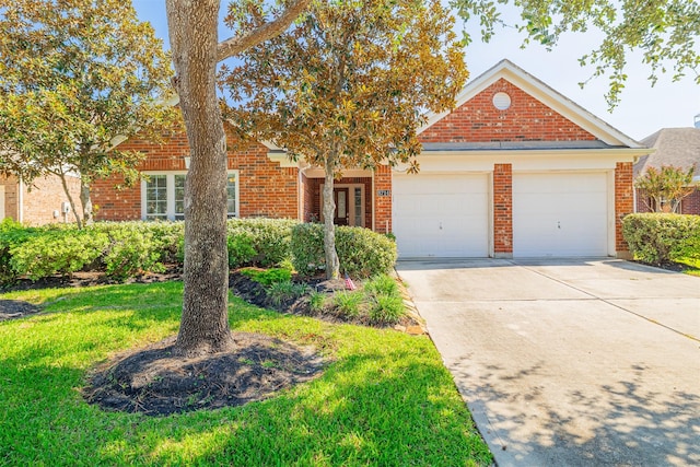 view of front of property featuring a garage, concrete driveway, brick siding, and a front lawn