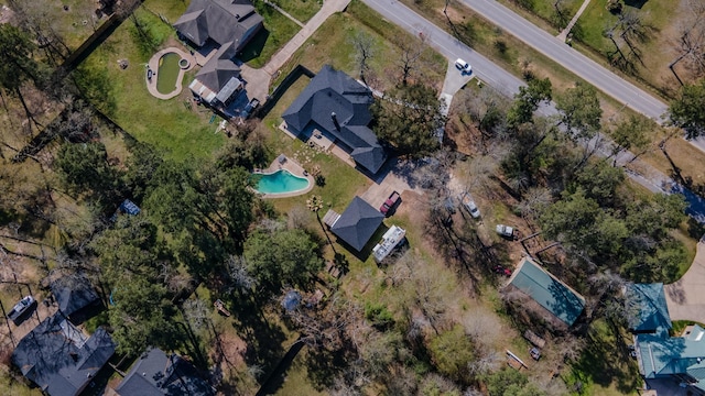 aerial overview of property's location with a pool area