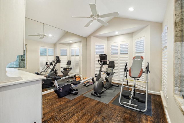 workout area featuring recessed lighting, vaulted ceiling, and baseboards