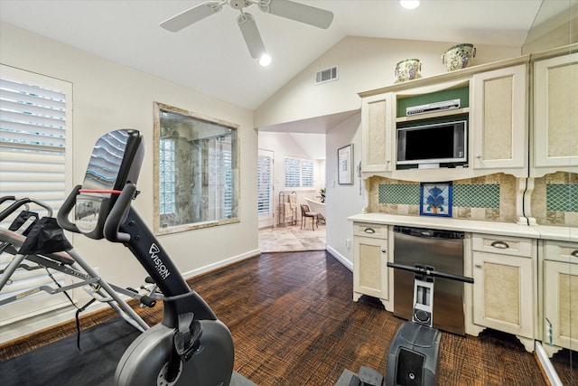 workout area with visible vents, vaulted ceiling, baseboards, and ceiling fan