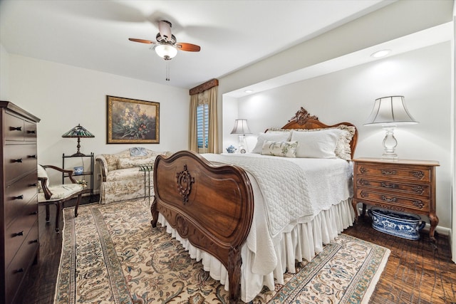 bedroom with ceiling fan and wood finished floors