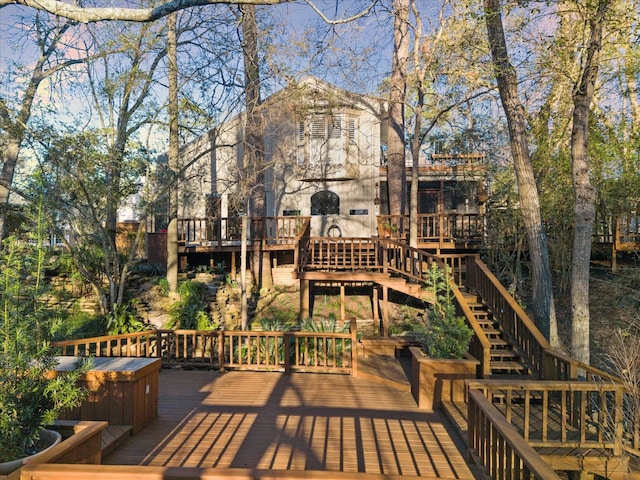 deck featuring stairway