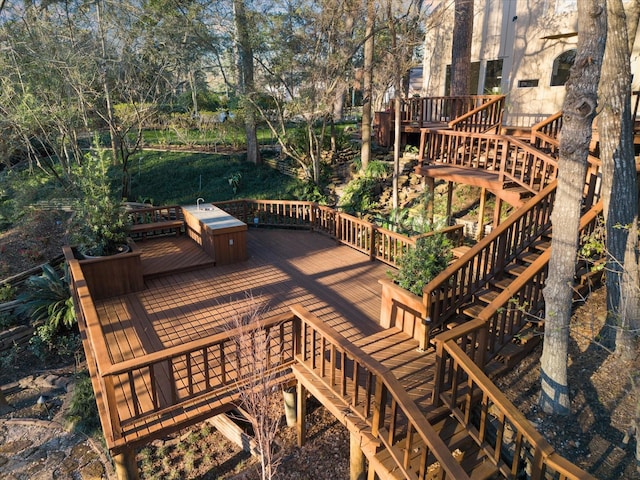 wooden terrace featuring stairs