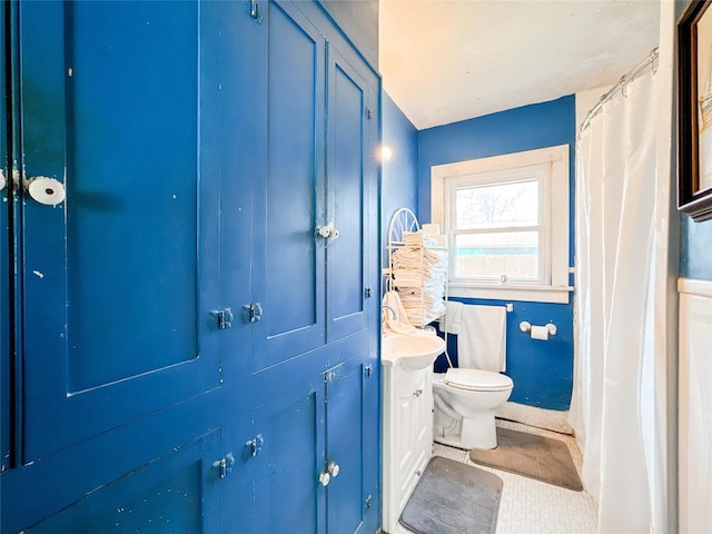 full bath with vanity and toilet