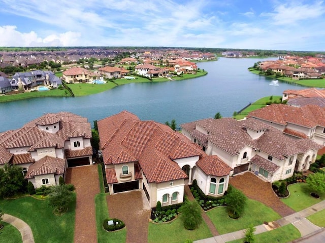 aerial view featuring a water view and a residential view