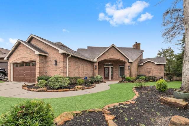 view of front of property featuring brick siding, roof with shingles, a chimney, concrete driveway, and an attached garage