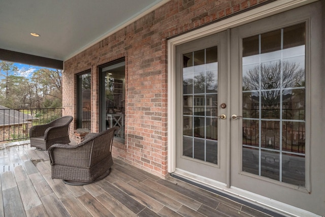 wooden terrace featuring french doors