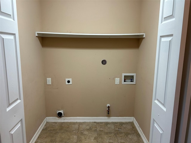 clothes washing area featuring gas dryer hookup, baseboards, washer hookup, and hookup for an electric dryer