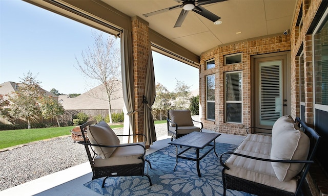 view of patio with ceiling fan and outdoor lounge area