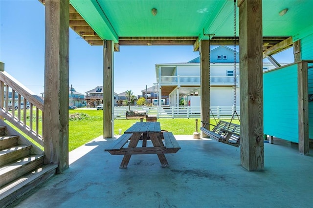 exterior space featuring a patio, a yard, and fence