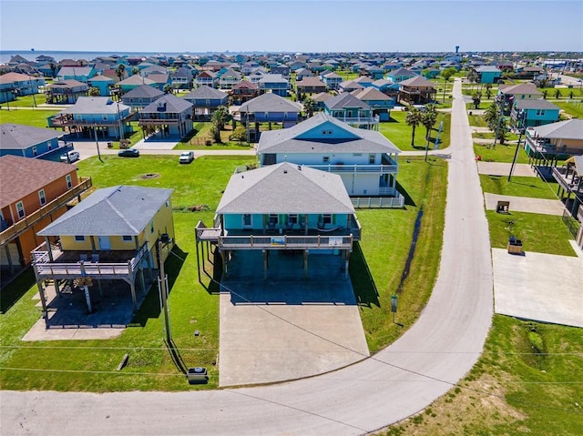 birds eye view of property with a residential view