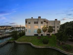 view of building exterior with a water view