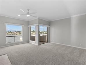 unfurnished living room featuring crown molding, carpet flooring, a ceiling fan, and baseboards