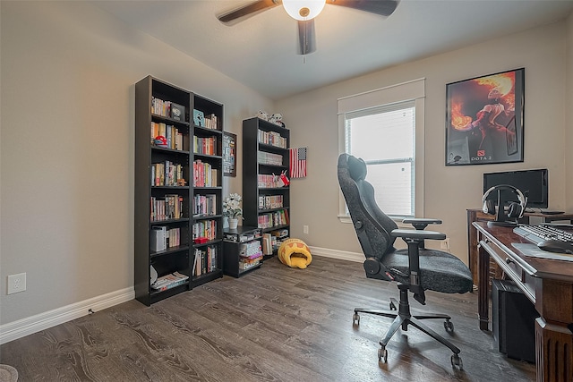 office space featuring a ceiling fan, dark wood finished floors, and baseboards