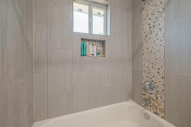 bathroom featuring shower / washtub combination