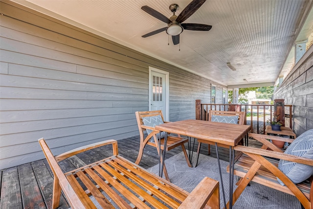 exterior space featuring ceiling fan and outdoor dining area