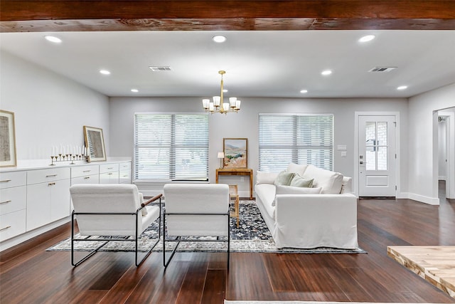 living area featuring dark wood-type flooring, recessed lighting, a chandelier, and visible vents