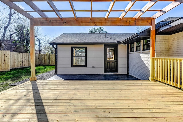 wooden deck with fence and a pergola