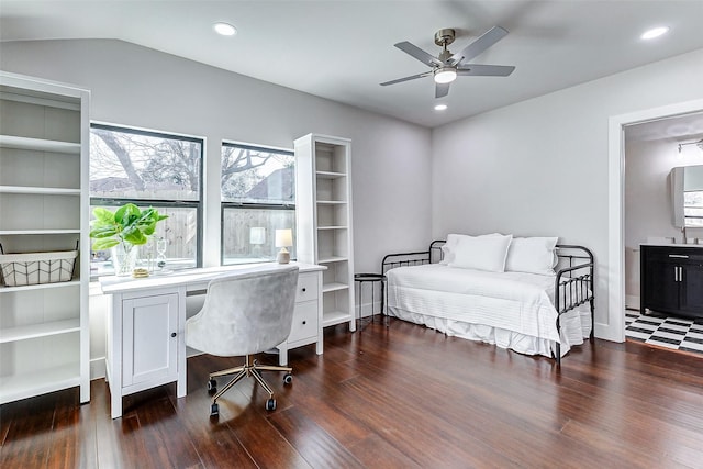 bedroom with baseboards, vaulted ceiling, wood finished floors, and recessed lighting