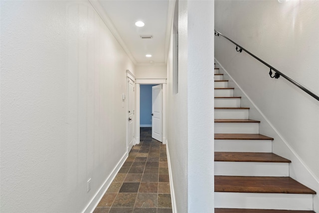 staircase featuring stone finish flooring, recessed lighting, visible vents, and baseboards