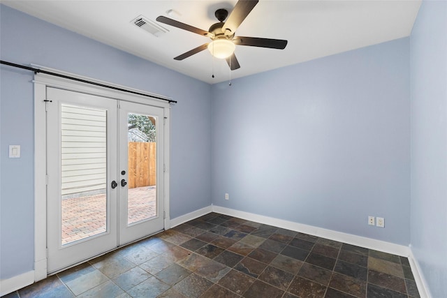 doorway to outside with french doors, visible vents, a ceiling fan, stone finish flooring, and baseboards