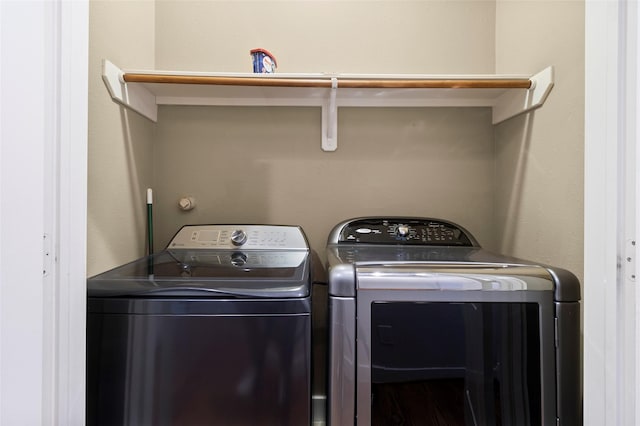 laundry room featuring laundry area and washer and clothes dryer