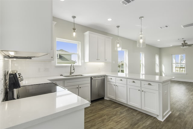 kitchen with a peninsula, electric range, a sink, visible vents, and dishwasher