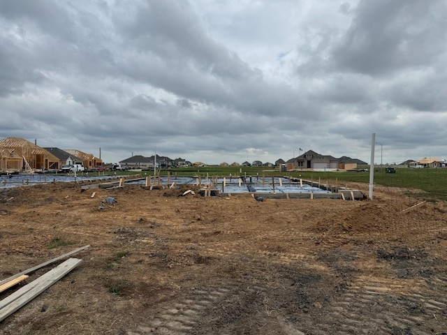 view of yard featuring a residential view