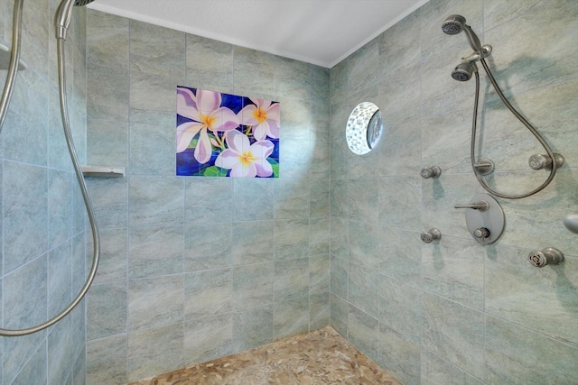 full bathroom with tiled shower