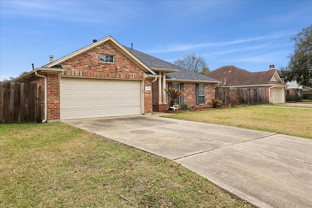 view of front facade with driveway, brick siding, a front lawn, and fence