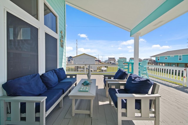 deck with an outdoor hangout area