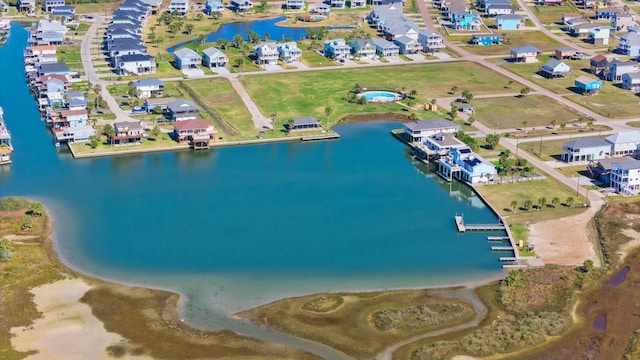 birds eye view of property featuring a residential view and a water view