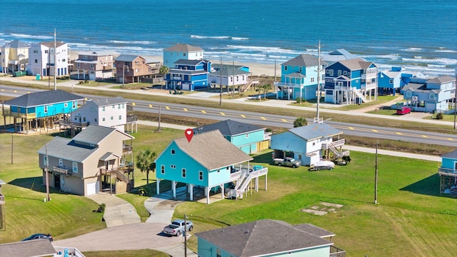 aerial view with a water view and a residential view