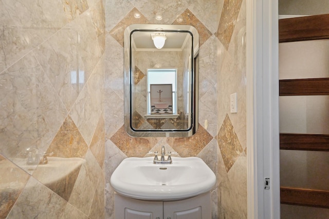 bathroom featuring tile walls and vanity