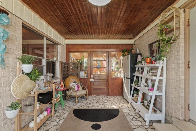 sunroom / solarium with wooden ceiling