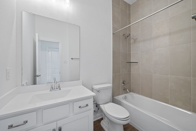 164 W Coralburst Loop, Montgomery, TX 77316 - bathroom featuring vanity, toilet, washtub / shower combination, and wood finished floors