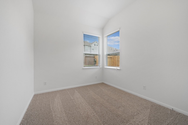164 W Coralburst Loop, Montgomery, TX 77316 - empty room with light colored carpet, lofted ceiling, and baseboards